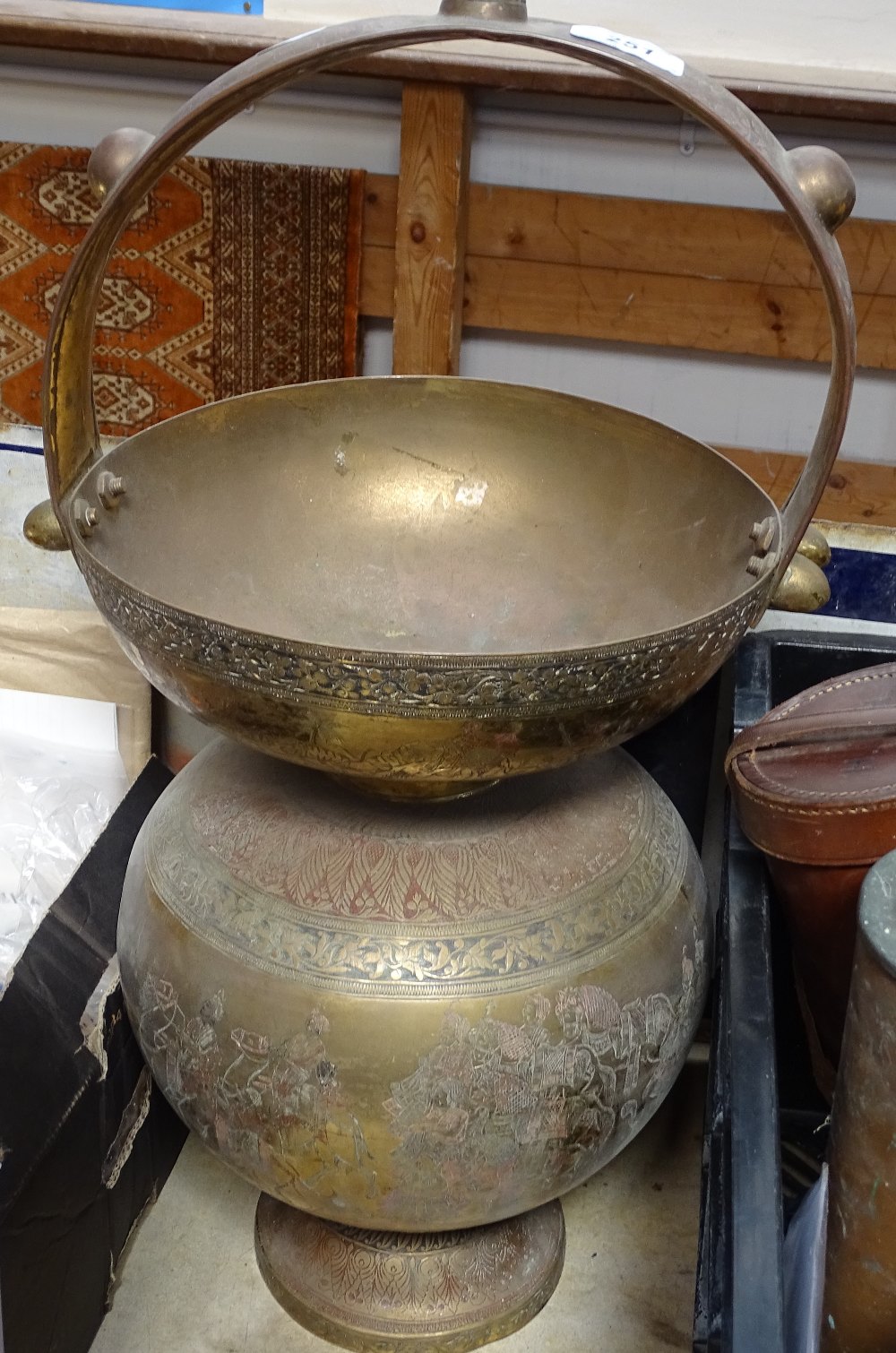 An Indian engraved and painted brass bucket, 22"