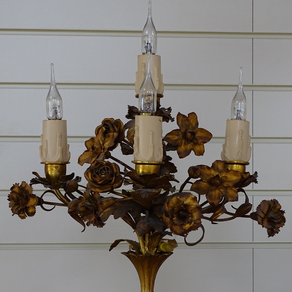 A gilt-metal 4-branch candelabrum, with floral decoration, and marble and gilt-metal plinth,