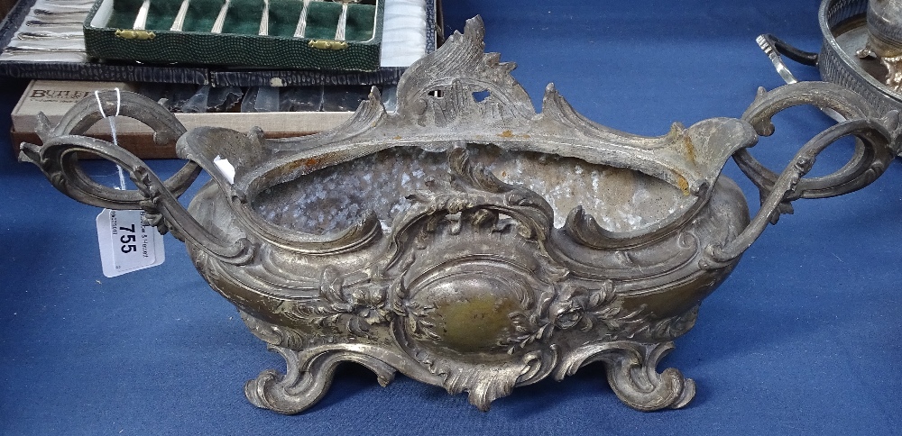 An ornate patinated table centre, with scrolled embossed decoration, length 41cm - Image 2 of 2
