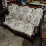 A 19th century carved and shaped mahogany-framed sofa, length 4'10"