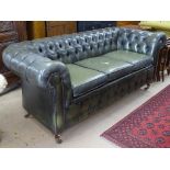 A large green leather button-back upholstered 3-seater Chesterfield settee, L210cm