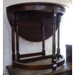 A carved oak rectangular occasional table, and an oak demilune drop leaf table