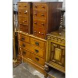 A pair of Victorian mahogany 4-drawer chests of narrow size, an Art Nouveau satin walnut 5-drawer