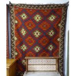A red ground Maimana Kilim rug, 197cm x 150cm