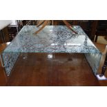 A Fiam Italy Rialto Deco bent glass coffee table, by Tord Boontje, printed pattern on both sides