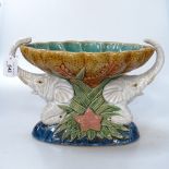 A Majolica style comport supported by 2 elephants, height 9.5"