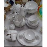 Extensive Rosenthal dinner and coffee set in white with silver trim