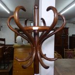 A mahogany bentwood hat and coat stand