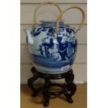 A Chinese blue and white teapot on wooden stand, height approx 13"