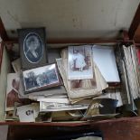 A suitcase with autograph albums, photographs, frames etc