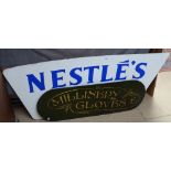 Gilded wood millinery and gloves sign, and a hardboard Nestle's Cream sign, length 54"