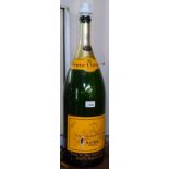 A Veuve Clicquot Brut salmanazar bottle converted to a table lamp