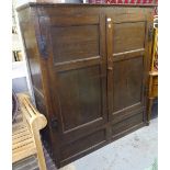 An Antique joined oak 2-door hall cupboard, W133cm