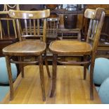 A pair of Polish bentwood side chairs, labels to the underside of the seat