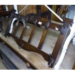 An Arts and Crafts oak hanging coat rack, L85cm