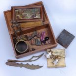 A mahogany box containing opera glasses, pocket watch stand, painting etc