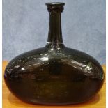 Antique green glass bottle, heigh7 7"