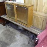 A folding garden bench, and an oak 2-door display cabinet