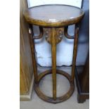 An Oriental design elm jardiniere stand, H85cm, W43cm