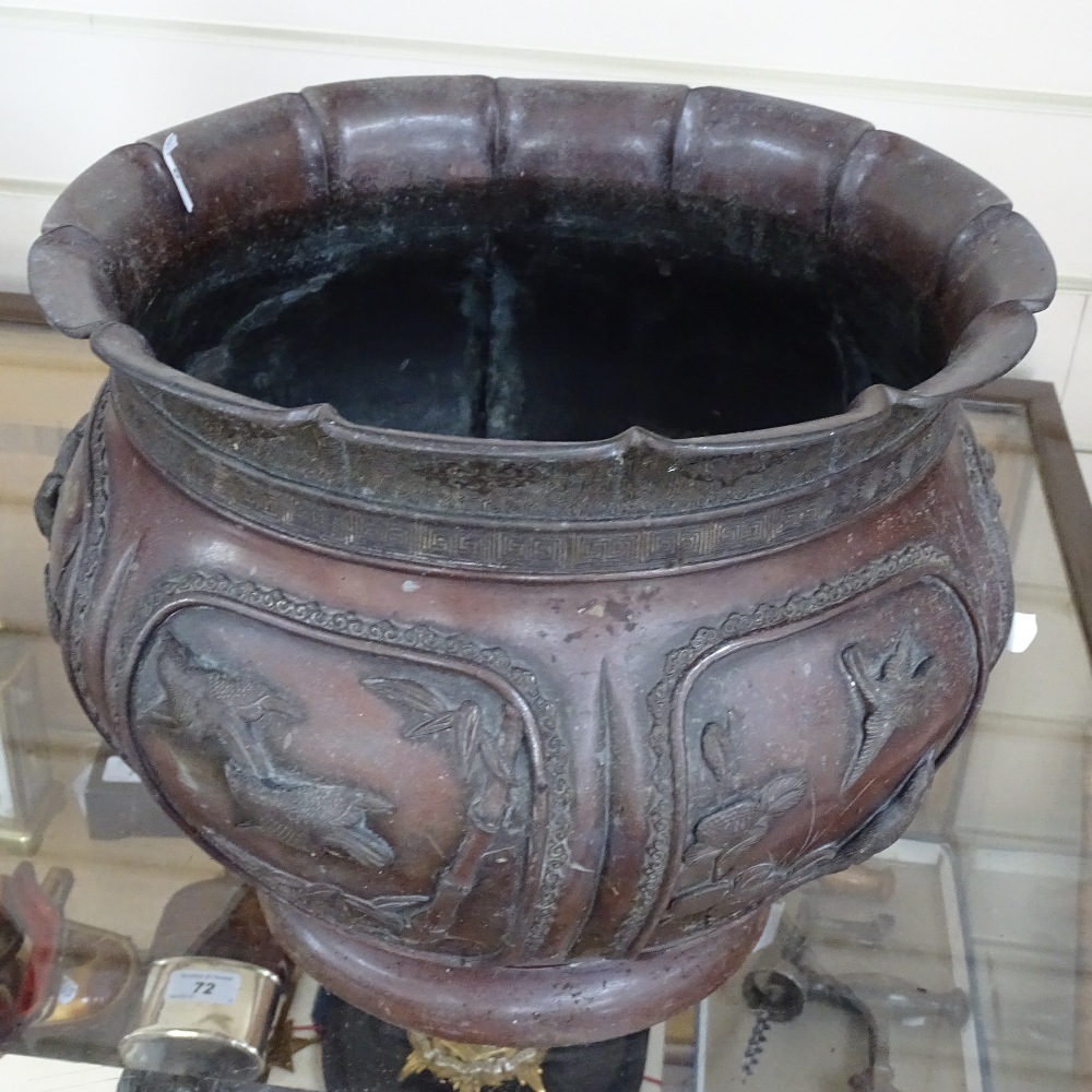 A Japanese bronze jardiniere with embossed birds and blossom decorated panels, lacking base, - Image 2 of 2