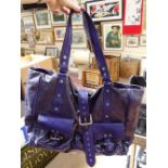 A large Mulberry purple leather shoulder bag, with dust bag