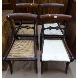 A set of 4 Regency rosewood dining chairs, with carved bar-backs, cane panelled seats, on saber leg