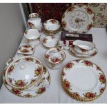 A Royal Albert Old Country Roses clock, dinnerware, a vase etc