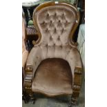 A Victorian button-back and carved mahogany-framed armchair