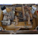 A box of carpenter's woodworking planes