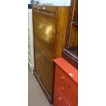 A Vintage oak office filing cabinet, with single tambour door, W81cm