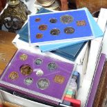 A collection of cased Royal Mint coin sets