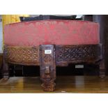 A demilune Moroccan stool, carved frieze and deep filled seat, W73cm