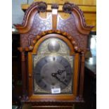 A good quality reproduction walnut Grandmother clock, with arch-top brass dial, and 3-train