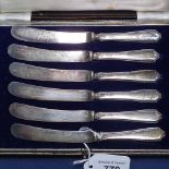 A cased set of 6 silver-handled tea knives