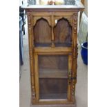 A Continental hardwood narrow hanging cabinet, with glazed door, W47cm, H89cm