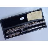A cased silver-plated flute