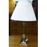 A brass Corinthian column table lamp and shade, height to top of shade 67cm