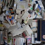 A large quantity of bundles of cigarette cards