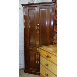A large 19th century mahogany 2-section corner cupboard, with 4 fielded panelled doors, W94cm,