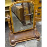 A Victorian swing toilet mirror with 3 jewell drawers, on bun feet, W70cm