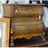 A small reproduction mahogany 3-drawer bombe chest, W65cm