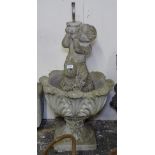 A concrete acanthus leaf design garden urn, and a cherub fountain