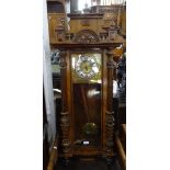 A Victorian walnut-cased Vienna regulator wall clock, with 2-train movement, L123cm