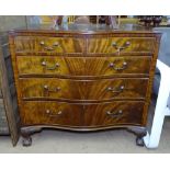 A mahogany serpentine-front chest of 2 short and 3 long drawers, raised on acanthus leaf carved legs