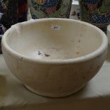 A British acid resistant large pestle, 14" diameter