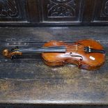 C. 1925 violin and bow, in fitted case. No label, back length 12"