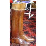 A pair of leather 1930s army riding boots with wooden trees