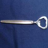 A Georg Jensen silver-handled bottle opener, length 14cm