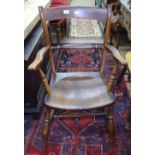 A Victorian elm-seated kitchen Windsor elbow chair