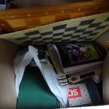A box of games, and a sewing machine